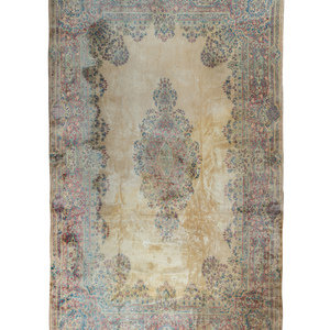 Appraisal: A Kirman Wool Rug th Century feet inches x feet