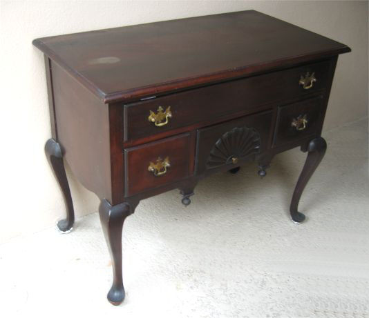 Appraisal: 's QUEEN ANNE STYLE MAHOGANY LOWBOY Shell carved design and