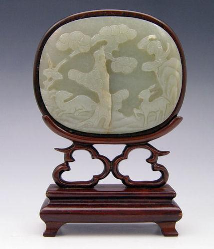 Appraisal: CHINESE MOSS JADE PLAQUE FRAMED IN ROSEWOOD Carved in longevity