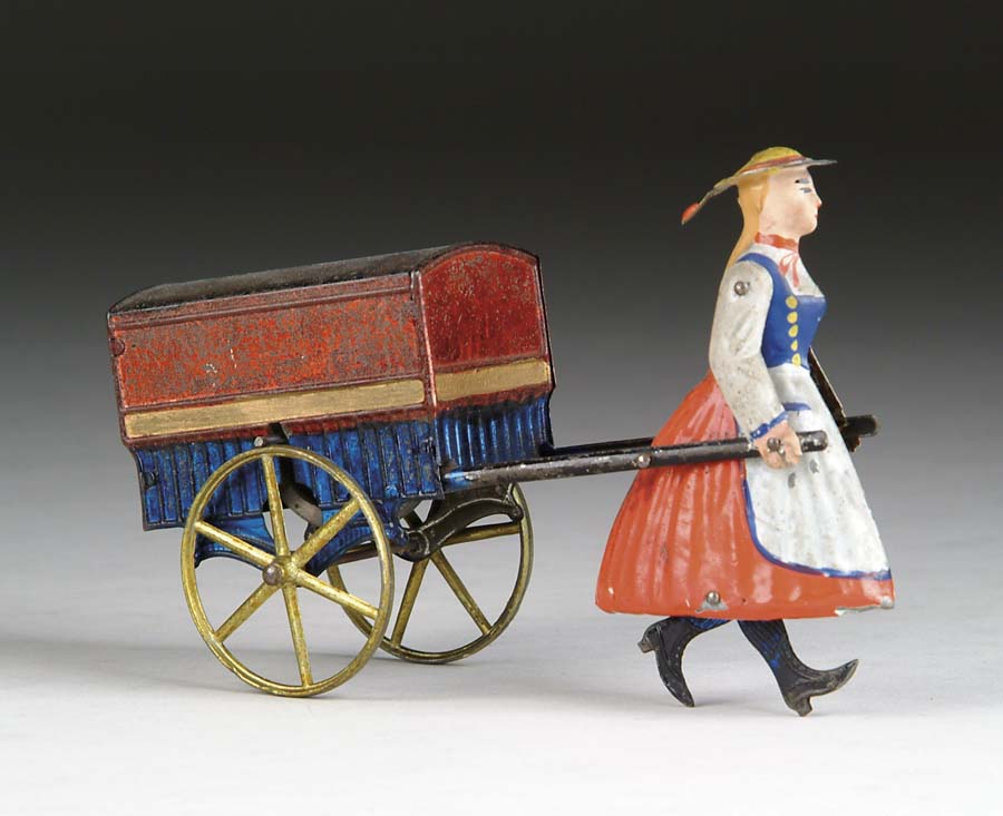 Appraisal: LADY PULLING EXPRESS WAGON Of French manufacture possibly by R