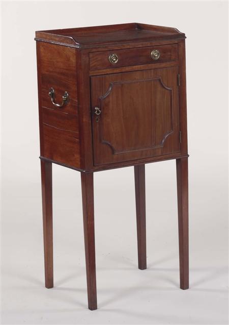 Appraisal: A th century mahogany side cabinet the three quarter gallery