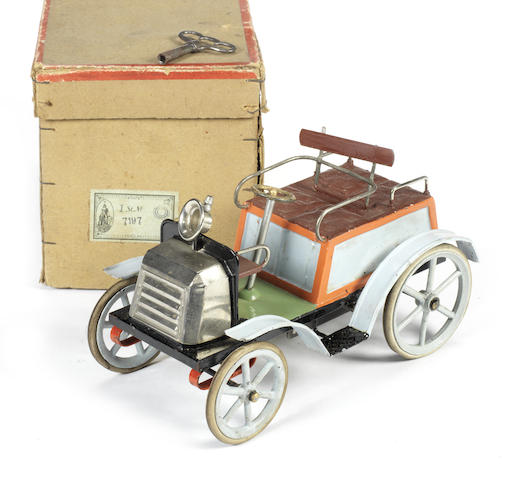 Appraisal: Bing boxed tinplate c w 'Dog Cart' toy car Hand