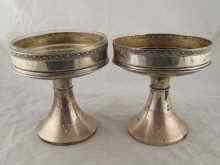 Appraisal: A pair of silver comports one with glass insert one