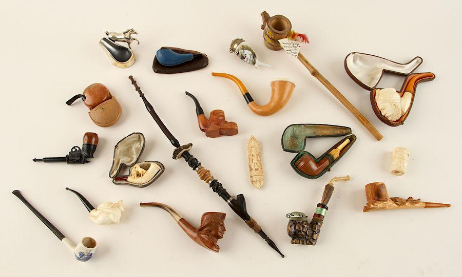 Appraisal: COLLECTION OF SIXTEEN PIPES WITH PIPE STAND A collection of