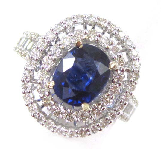 Appraisal: BLUE SAPPHIRE DIAMOND AND WHITE GOLD RING The k white