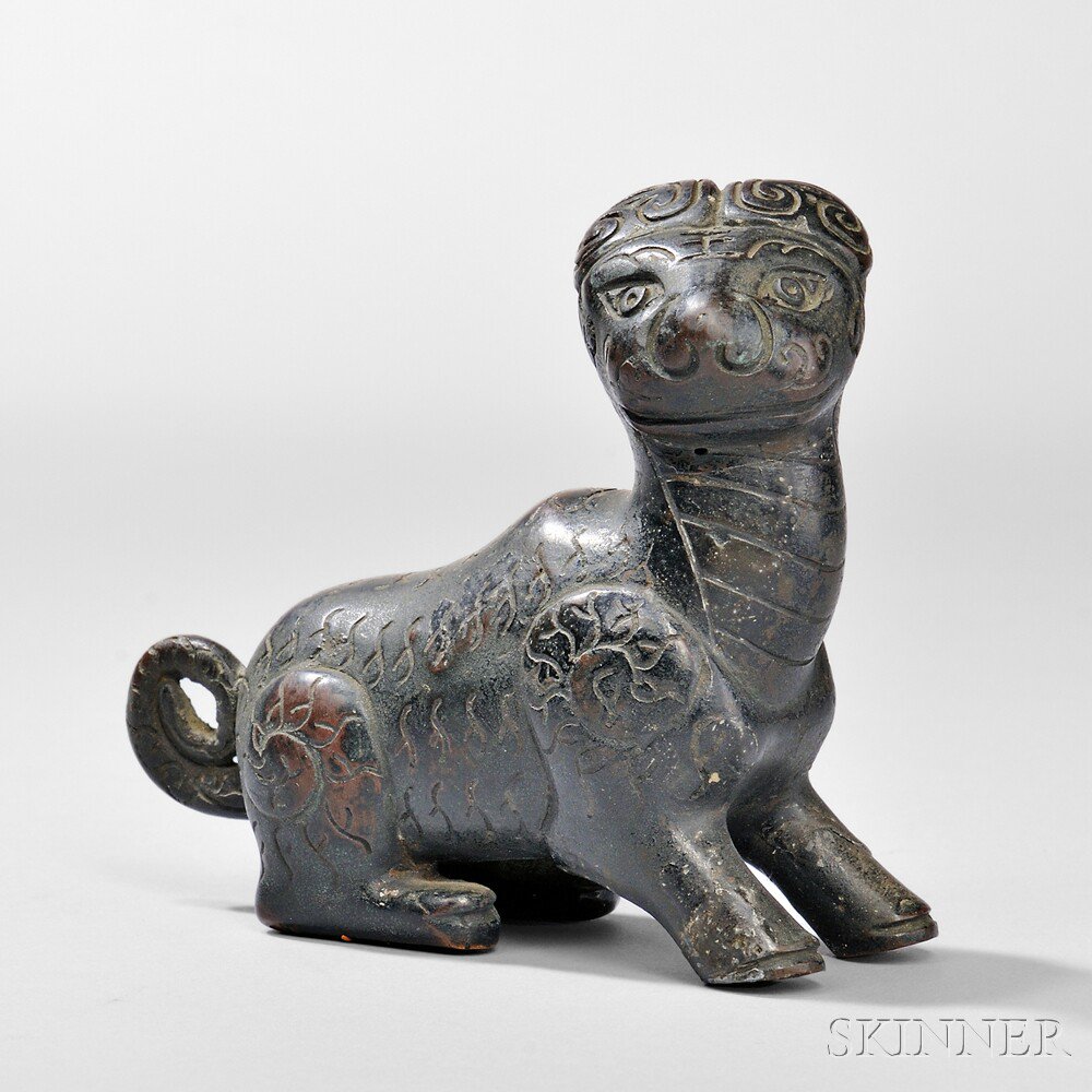 Appraisal: Bronze Mythical Animal China possibly Tang dynasty half-seated with its