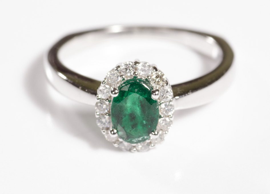 Appraisal: EMERALD DIAMOND AND FOURTEEN KARAT GOLD RING The white gold