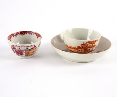 Appraisal: A Chinese iron red tea bowl and saucer painted two