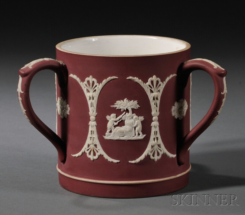 Appraisal: Wedgwood Crimson Jasper Dip Three-handled Cup England c cylindrical form