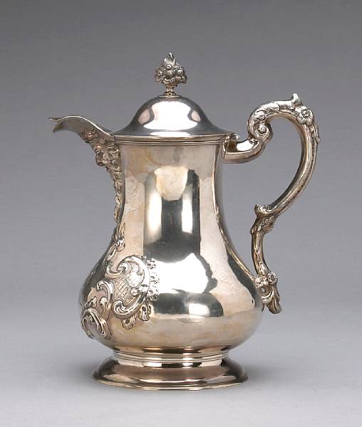 Appraisal: A silver large covered water pitcherUnmarked mid th centuryLater monogram