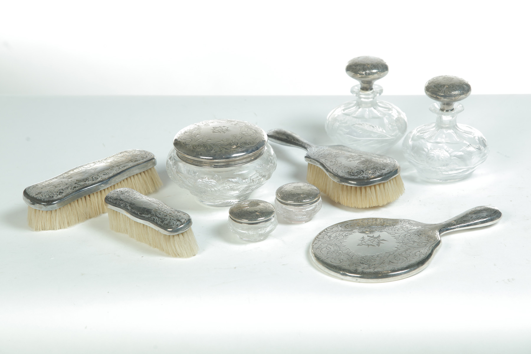 Appraisal: NINE PIECES HAWKES GRAVIC DRESSER SET WITH GORHAM STERLING MOUNTS