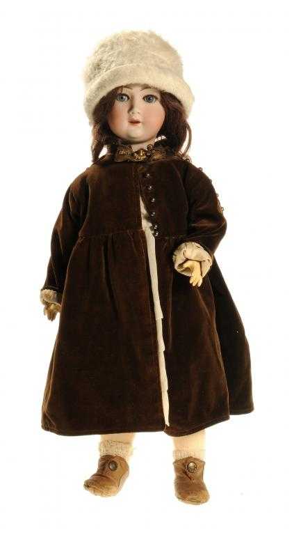 Appraisal: A GERMAN DOLL the Gebruder Heubach bisque head with weighted