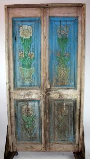 Appraisal: Pair of large scale rustic entry doors with floral carvings