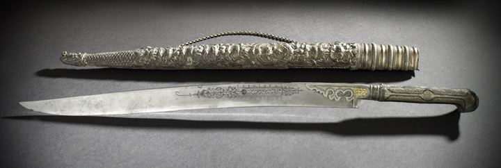 Appraisal: Large Middle Eastern Dagger with Damascened Hilt and Engraved Steel