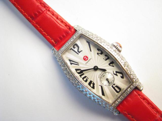 Appraisal: A lady's Michelle coquette watch with diamond bezel and case