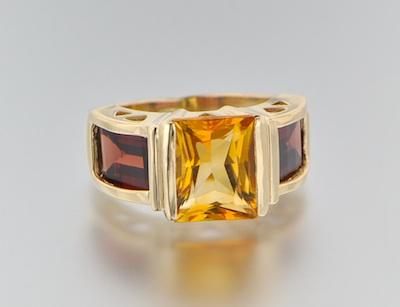 Appraisal: A Citrine and Garnet Ring k yellow gold ring set