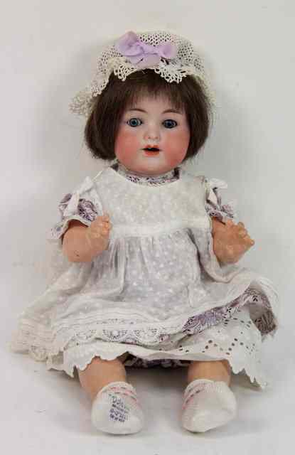 Appraisal: An Armand Marseille bisque headed doll A M with blue