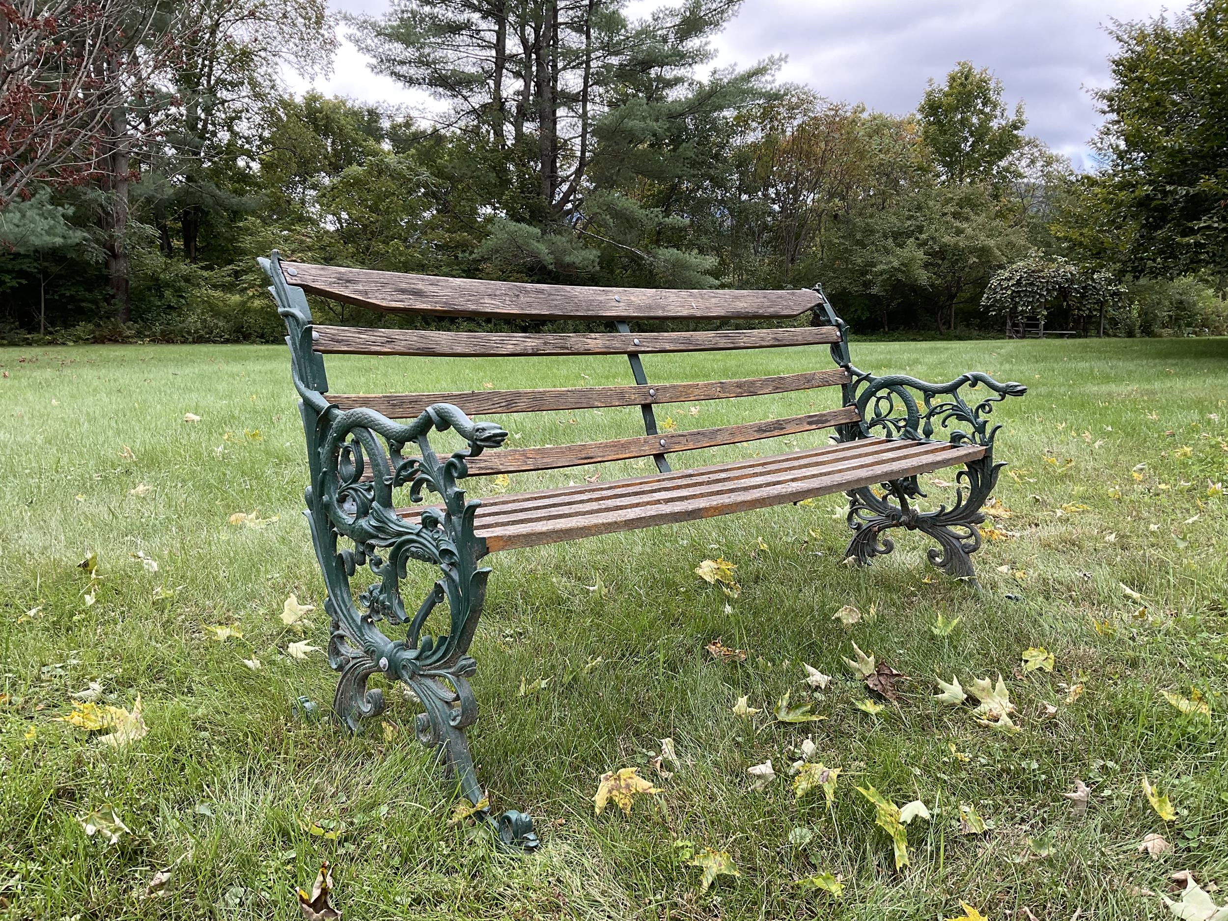 Appraisal: TH C CAST IRON GARDEN BENCH Green painted cast iron