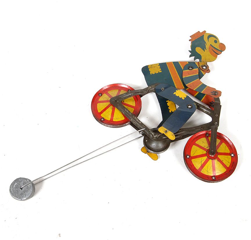 Appraisal: High-Wire Bicycle Balance Toy A mechanical weighted tin bicycle toy