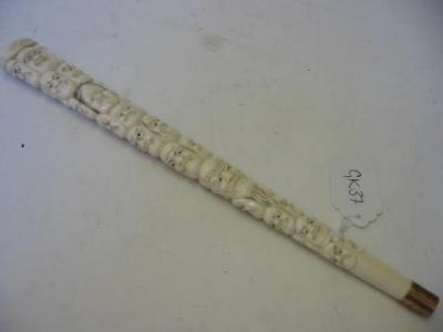 Appraisal: AN IVORY PARASOL HANDLE of tapering form the whole carved