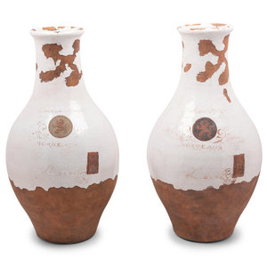 Appraisal: A Pair of French Glazed Terra Cotta Storage Jars Height