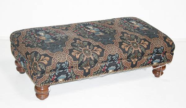 Appraisal: A Victorian needlepoint upholstered ottoman height in width in depth