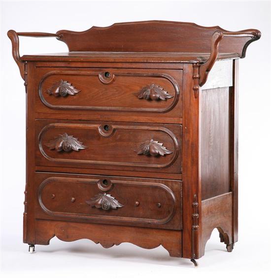 Appraisal: WASHSTAND Walnut with two towel bars and three carved and