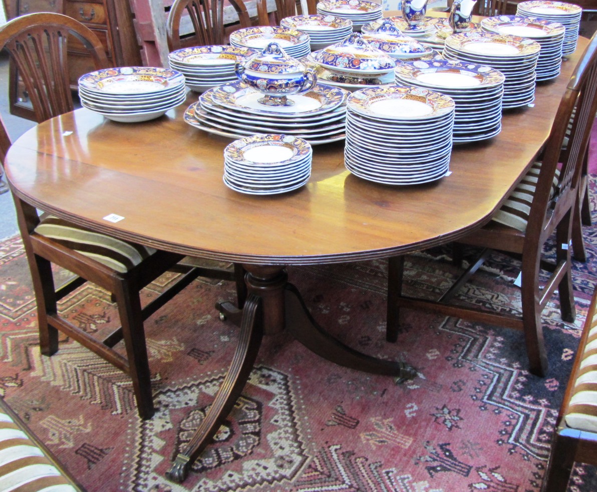 Appraisal: A Regency style mahogany 'D' end twin pedestal dining table