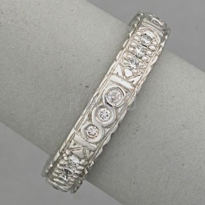 Appraisal: PLATINUM DIAMOND ETERNITY BAND ca ct TW embossed braid edge