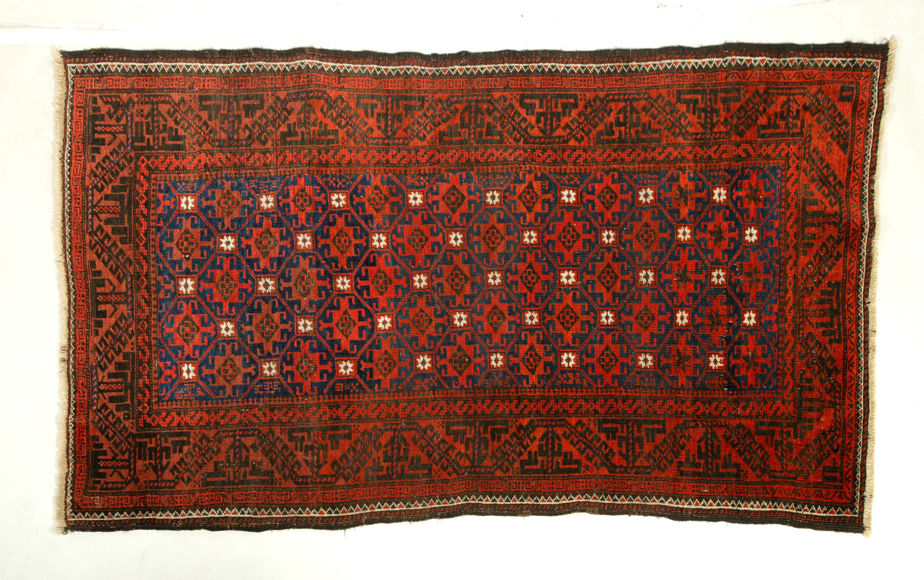 Appraisal: ORIENTAL RUG Ca Belouch Geometric with a blue ground '