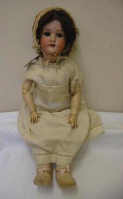 Appraisal: A Heubach Koppelsdorf bisque head doll with brown lashed sleeping