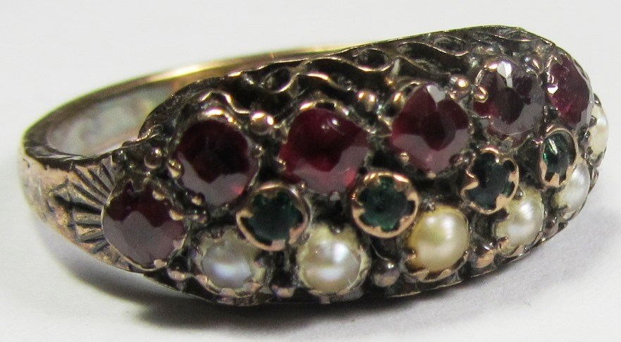 Appraisal: A Victorian ct gold half pearl red and green gem