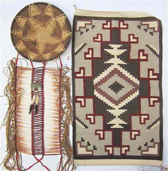 Appraisal: THREE INDIAN COLLECTIBLES Navajo mat or wall hanging central medallion