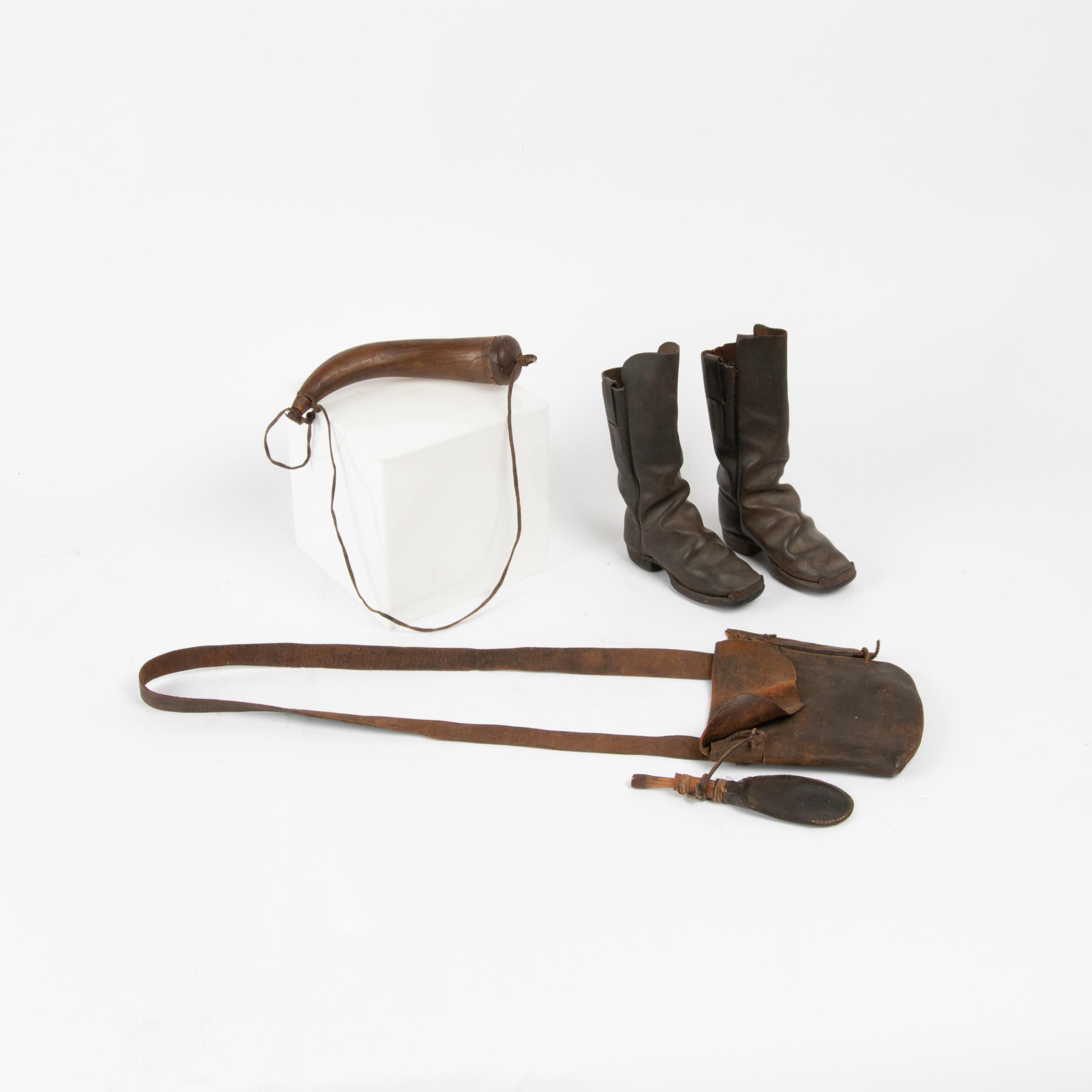 Appraisal: EARLY CHILD'S LEATHER BOOTS NECESSARY BAG AND POWDER HORN Lot