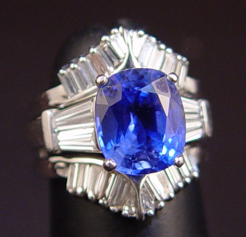 Appraisal: PLATINUM CT SAPPHIRE RING WITH DIAMONDS AND DIAMOND INSERT GUARD