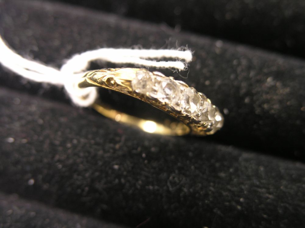 Appraisal: An ct gold five stone diamond ring carved setting ring