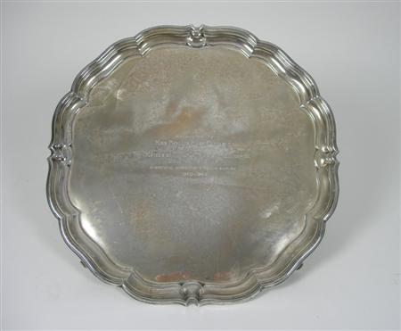 Appraisal: A modern salver Sheffield of shaped circular outline with raised