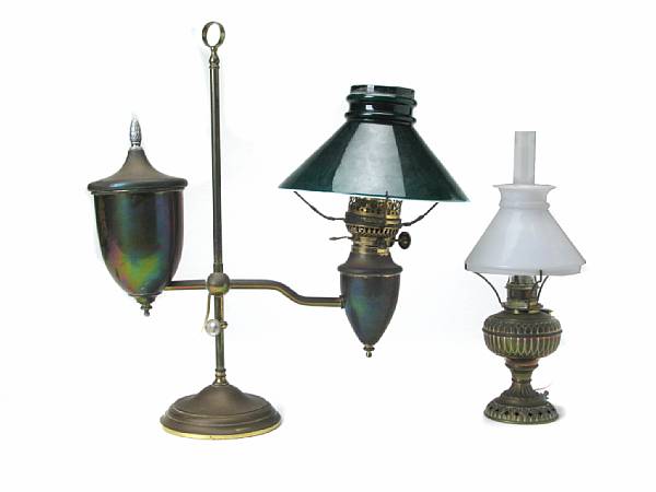 Appraisal: A group of nine brass and glass lamps comprising one