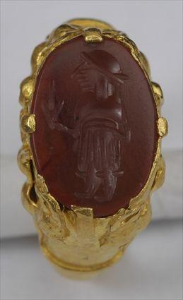 Appraisal: EARLY PERSIAN AGATE INTAGLIO SET IN A GOLD RING Size