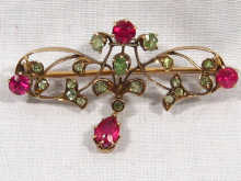 Appraisal: A late th century Russian carat gold ruby and demantoid