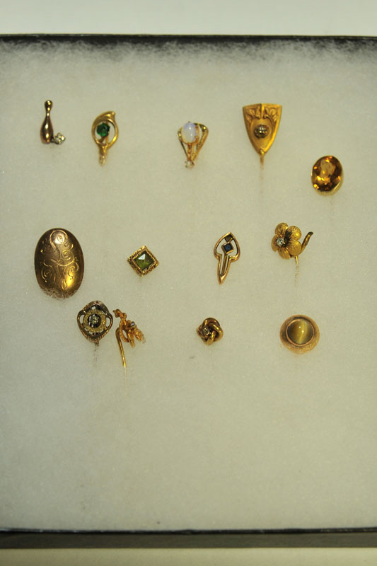 Appraisal: THIRTEEN STICK PINS Seven marked '' K'' three with diamonds