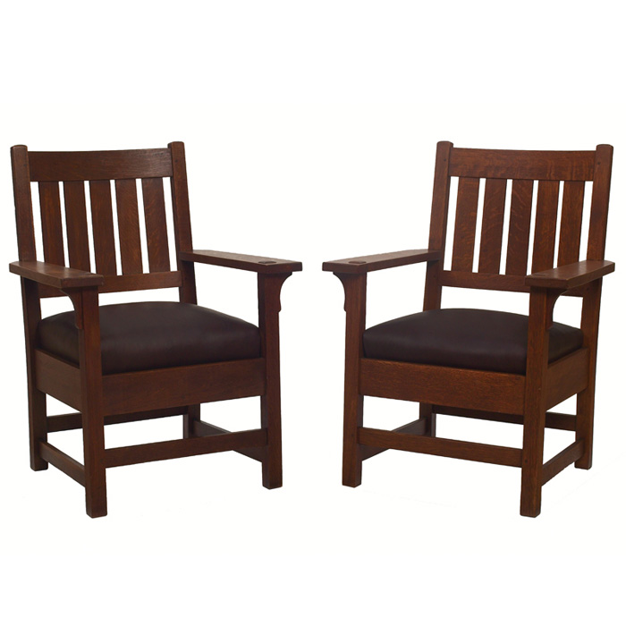 Appraisal: Gustav Stickley armchairs pair five vertical slats to back over