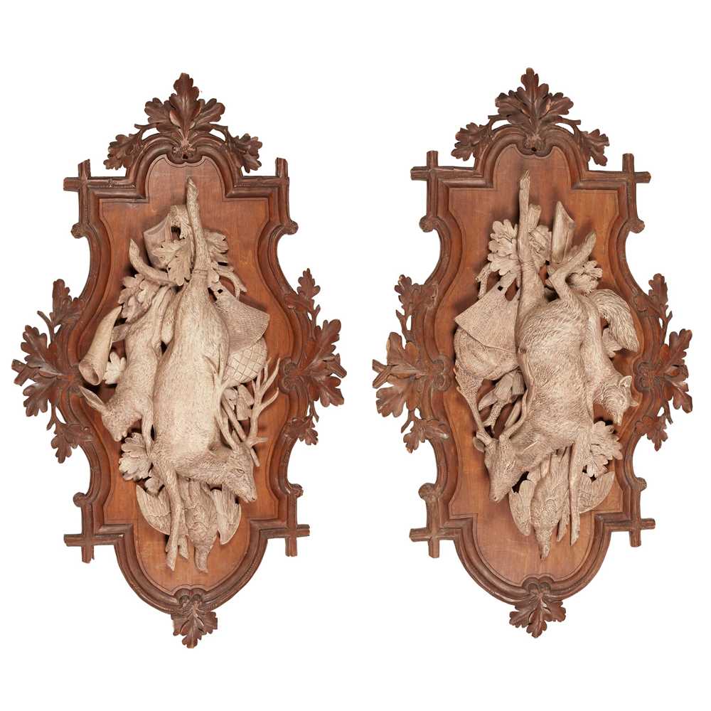 Appraisal: PAIR OF BLACK FOREST CARVED HUNTING TROPHIES LATE TH CENTURY