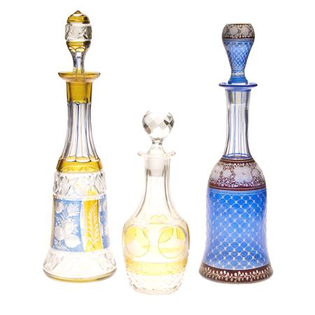 Appraisal: Group of Three Color and Colorless Glass Decanters Estimate -