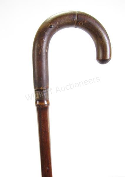 Appraisal: Gun Rest Cane bamboo shaft hides a brass telescopic rod