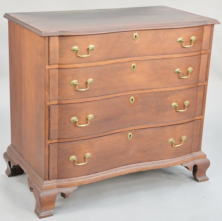 Appraisal: Cherry Chippendale oxbow chest having shaped top over conforming set