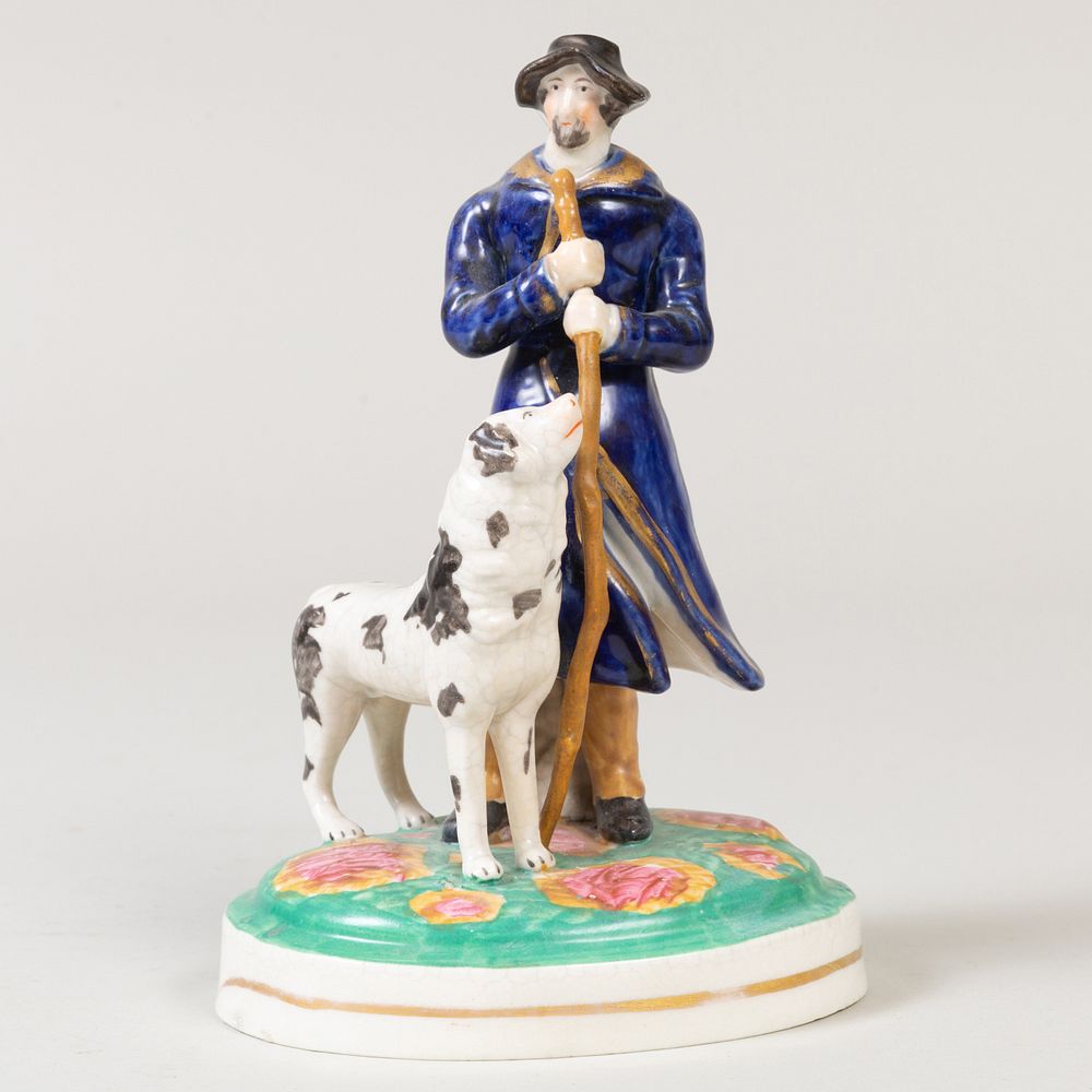 Appraisal: Staffordshire Pottery Model of a Shepherd and his Dog in