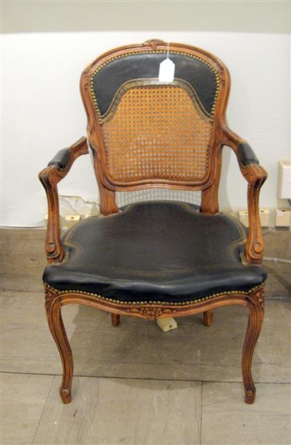 Appraisal: Pair of Louis XV style fauteuils The curved and caned