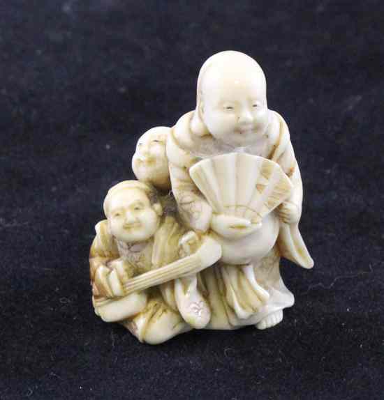 Appraisal: A Japanese ivory netsuke late th early th century in