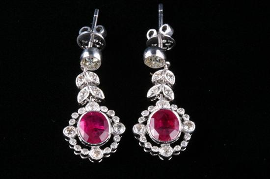 Appraisal: PAIR K WHITE GOLD RUBY AND DIAMOND EARRINGS Articulated dangle